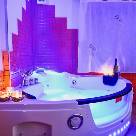 With Jacuzzi And Fireplace In The *